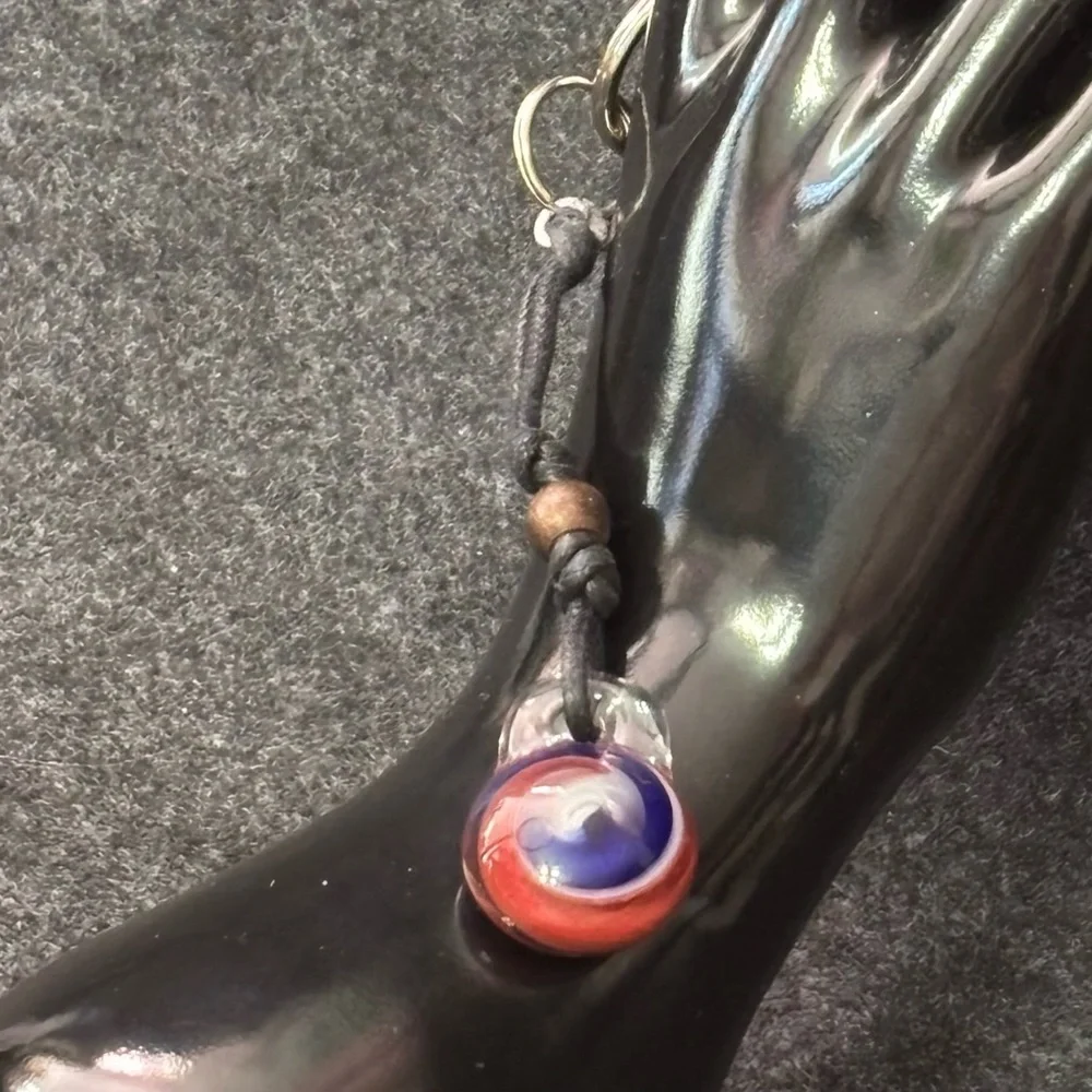 Red, White and Blue Marble Swirl Glass Pendant on Black Cord Keychain